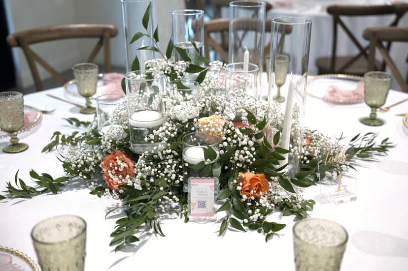 Gypsophila and candles down the centre of a table
